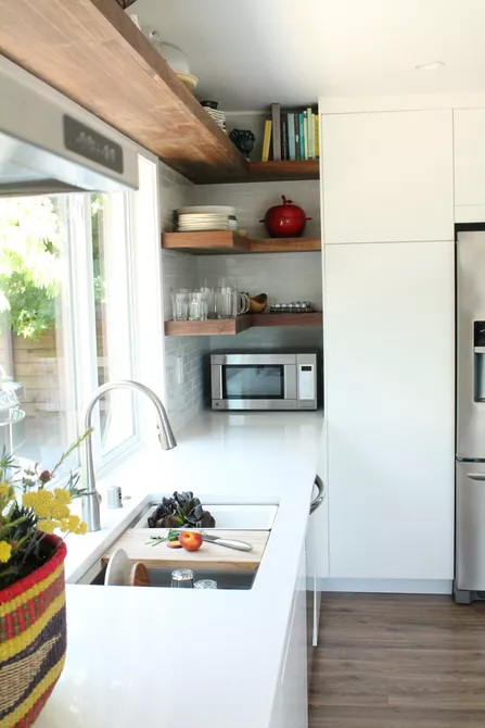 SHELVING IN A CORNER KITCHEN AREA